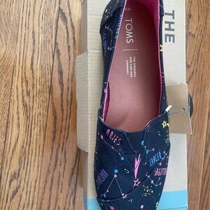 TOMS Black and Pink Astrology Slip-On Shoes